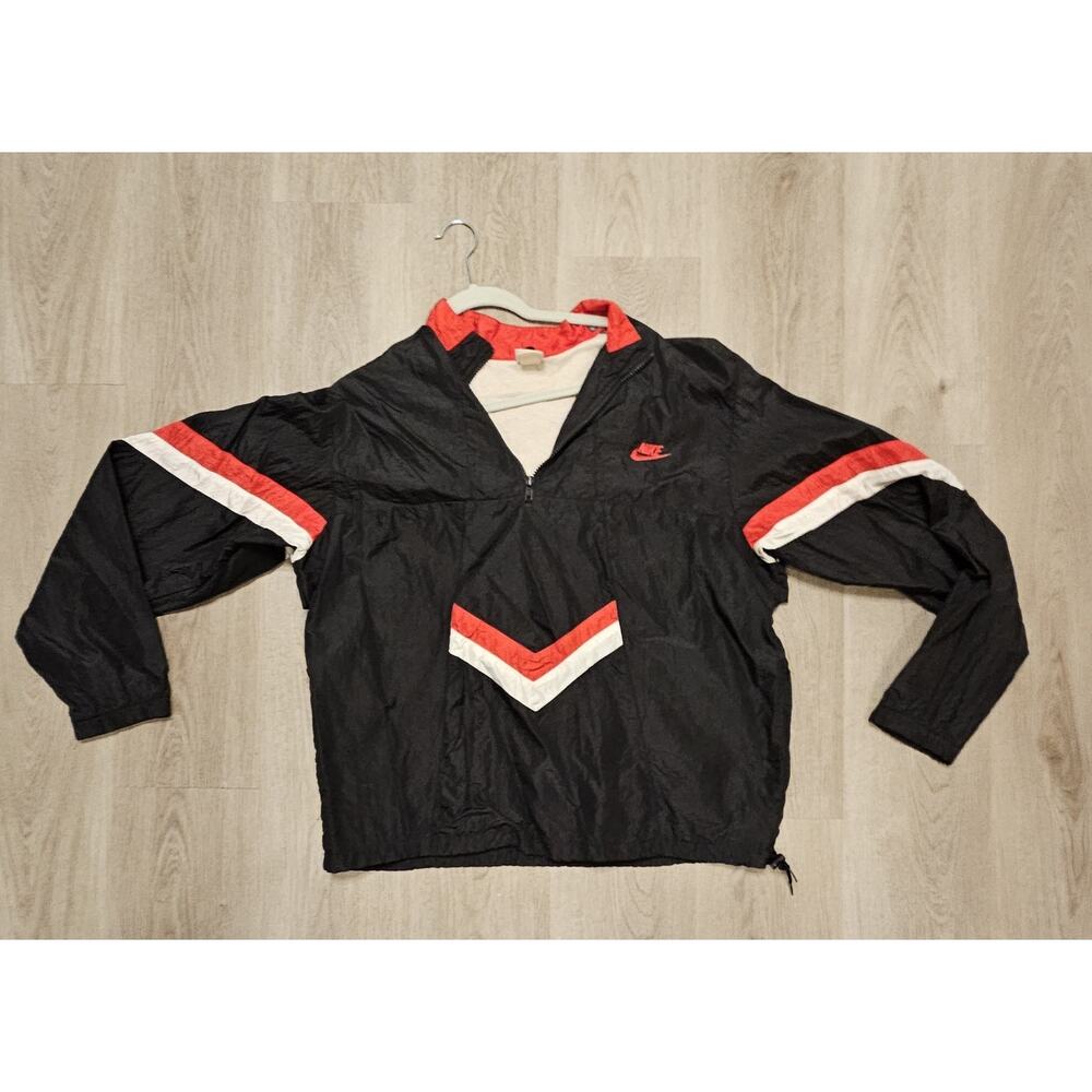 1980s Nike windbreaker jacket in black, white, and red nylon size xl